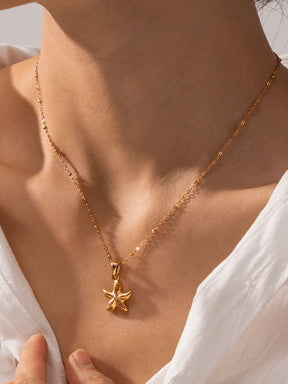 Collier étoile de mer plaqué or porté harmonie