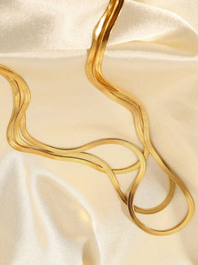 Collier triple chaîne dorée cascade