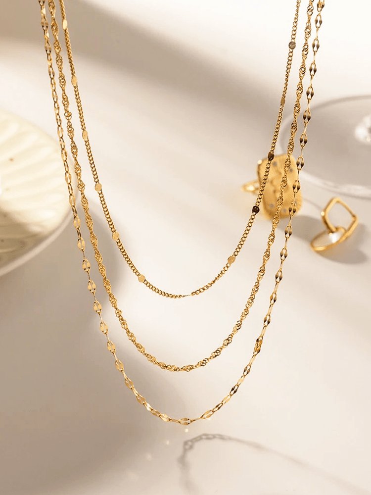 Collier trois rangs or style grâce