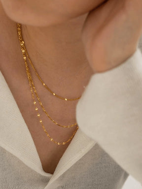 Collier superposé or détail harmonie