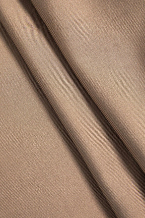 Combinaison chic beige détail manches raffinement