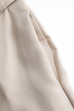 Combinaison chic beige vue de profil douceur