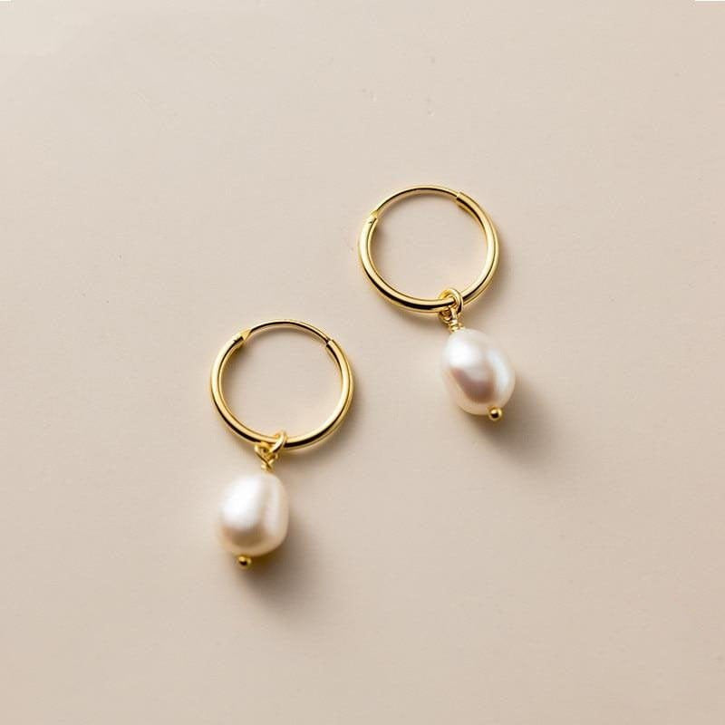 Boucles créoles dorées avec perle pureté