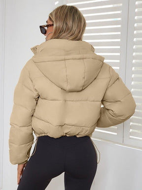 Doudoune beige vue de dos étoile