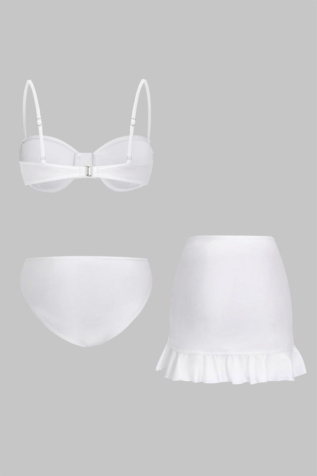 Ensemble bikini blanc avec jupe paréo drapée vague