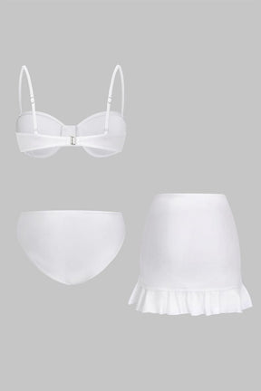 Ensemble bikini blanc avec jupe paréo drapée vague