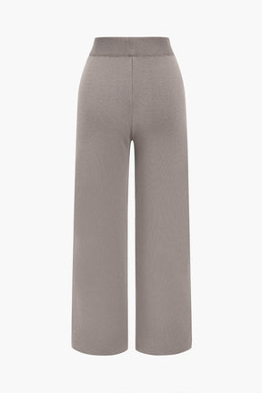 Détail boutons cardigan tricot fleur