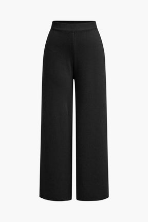 Détail boutons dorés cardigan noir raffiné