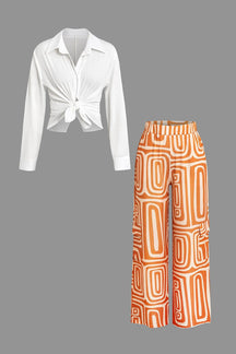 Ensemble chemise blanche et pantalon imprimé soleil