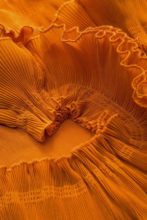 Vue latérale ensemble coordonné orange élégance