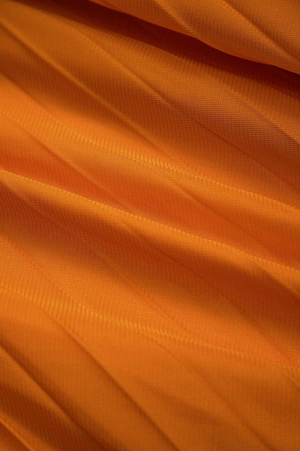 Détail de la taille du pantalon orange confort