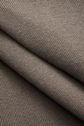 Ensemble tricot col roulé motif losanges bicolore vue dynamique énergie