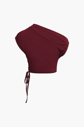 Ensemble Crop Top Asymétrique et Jupe Longue à Cordons