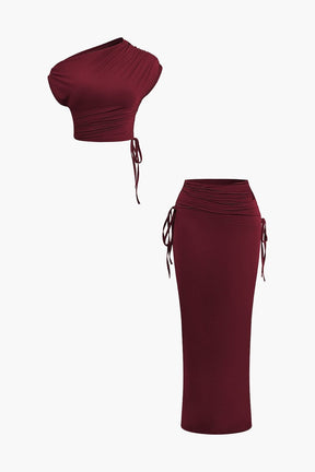 Ensemble Crop Top Asymétrique et Jupe Longue à Cordons