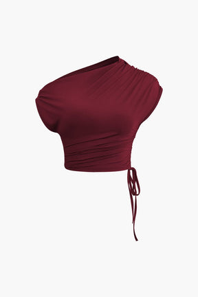 Ensemble Crop Top Asymétrique et Jupe Longue à Cordons