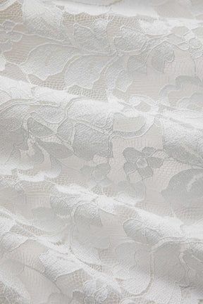 Ensemble dentelle blanc vue arrière horizon