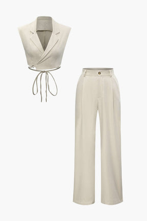 Ensemble beige élégant avec gilet croisé soleil