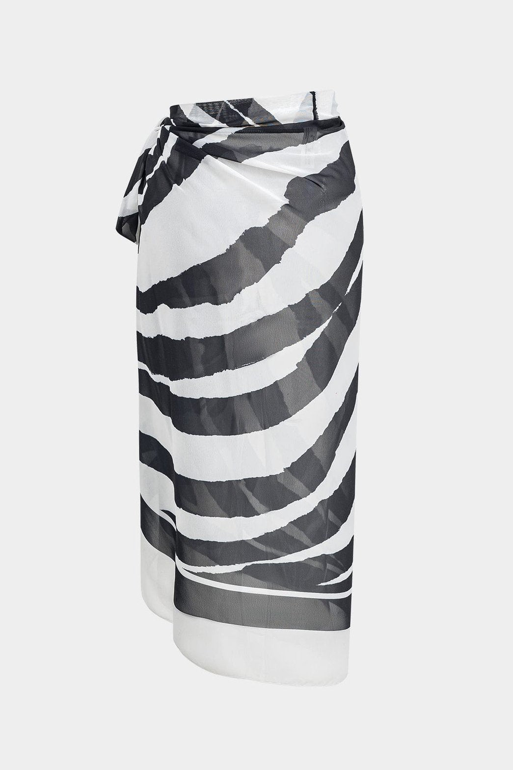Vue de profil ensemble maillot et paréo sable