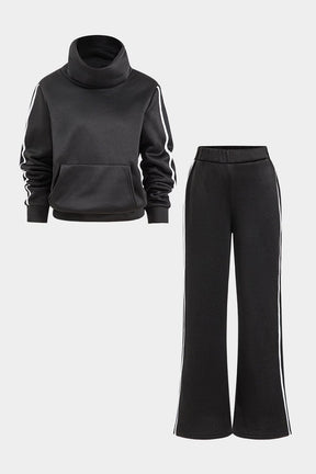 Ensemble sportswear noir col roulé vue avant félin