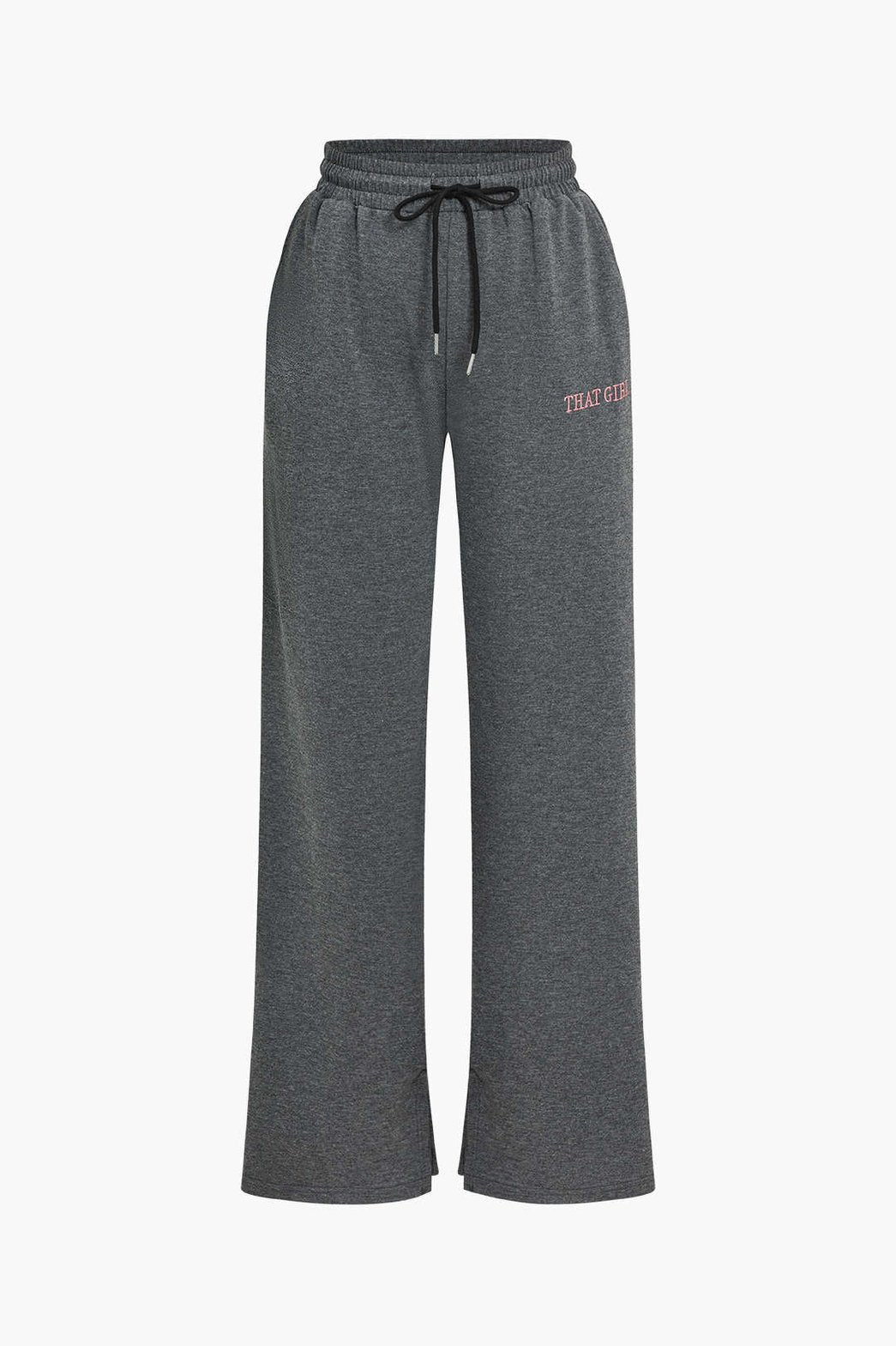 Détail du pantalon sportswear gris brise