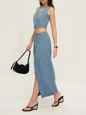 Gilet court en denim bleu détail boutons nuage
