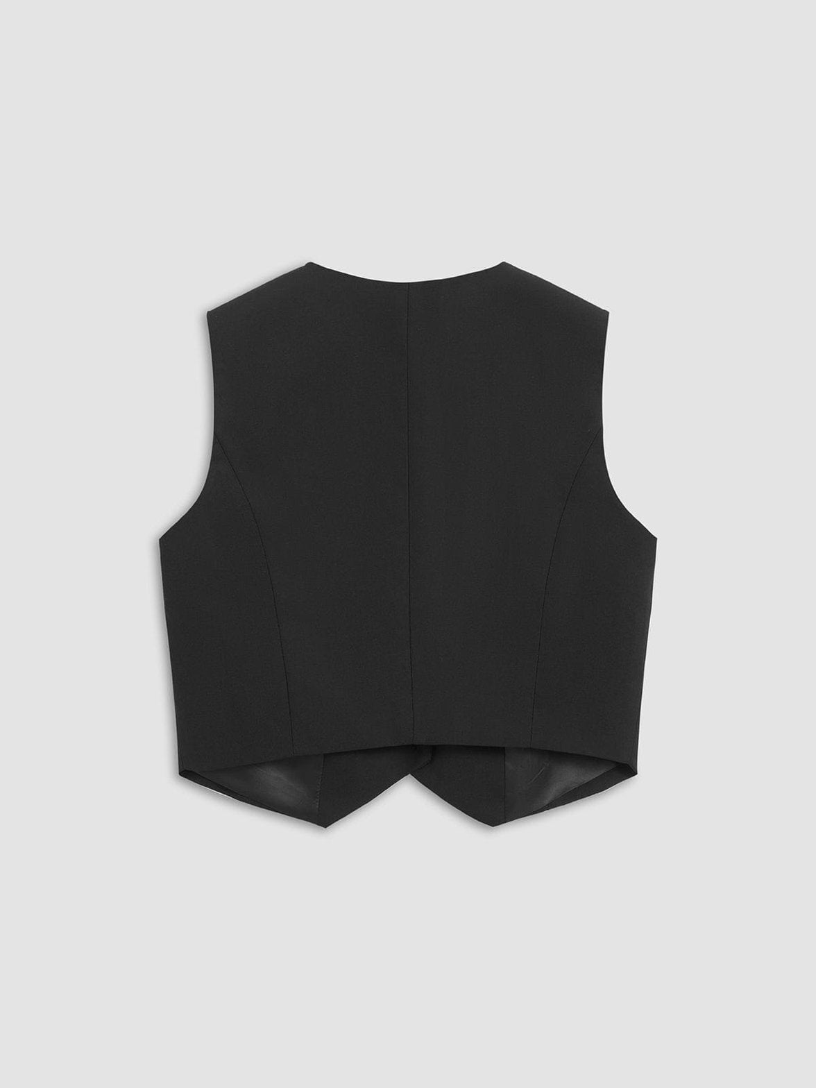 Gilet noir court élégant détail coupe raffinement