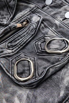 Gilet en denim gris détail des finitions métalliques étoile