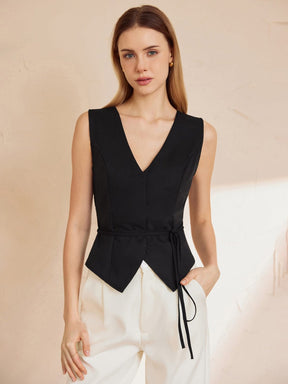 Gilet noir ajusté vue de dos soleil
