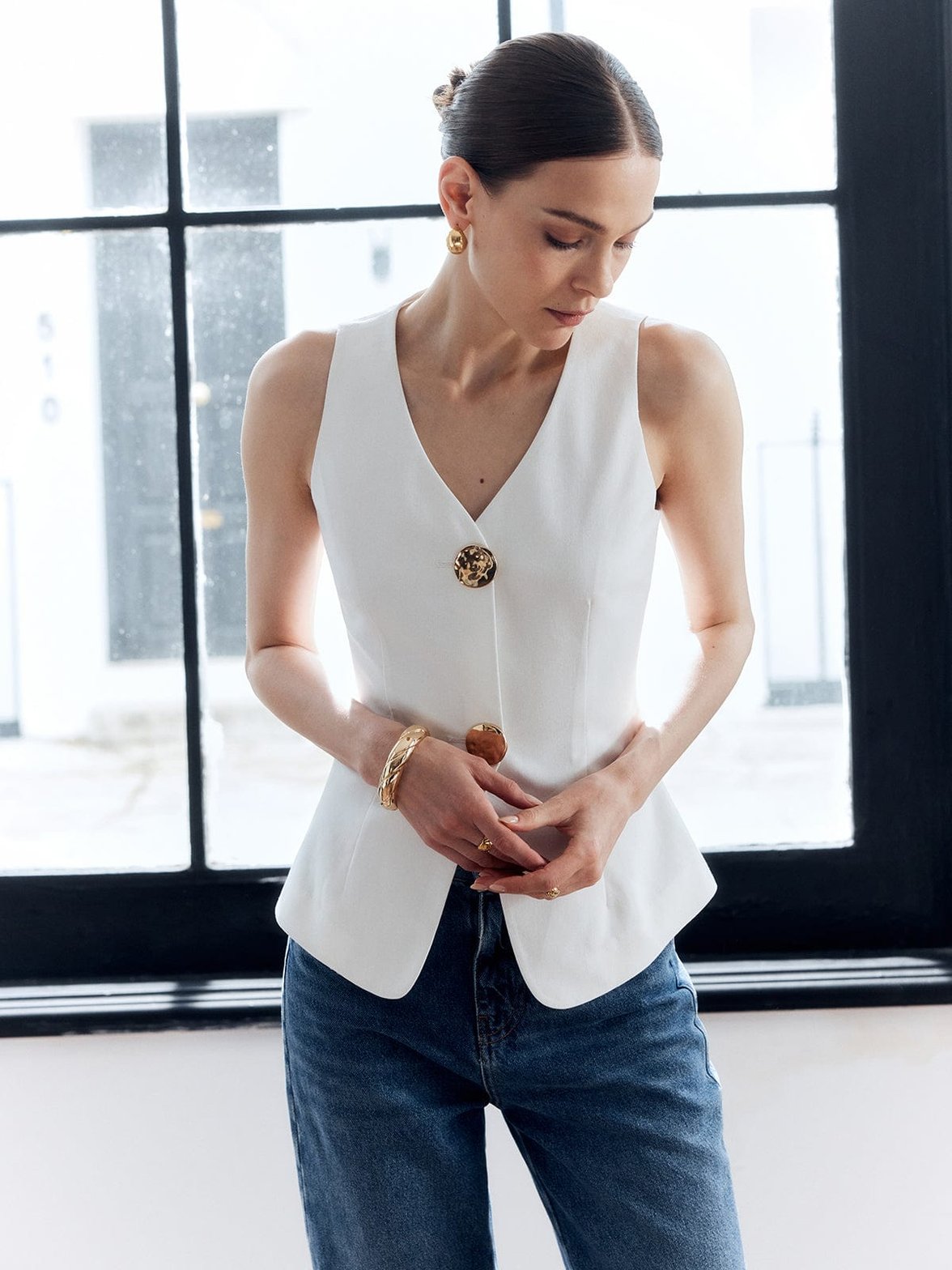 Gilet blanc vue dos brise
