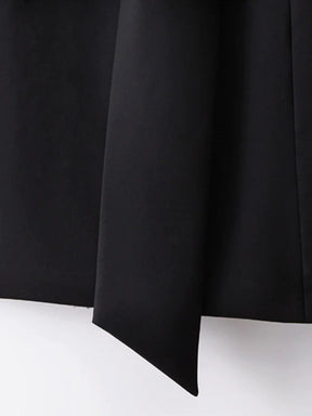 Gilet chic noir coupe élégante cristal