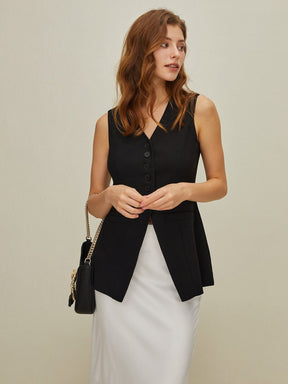 Gilet noir élégant détail boutonnage harmonie