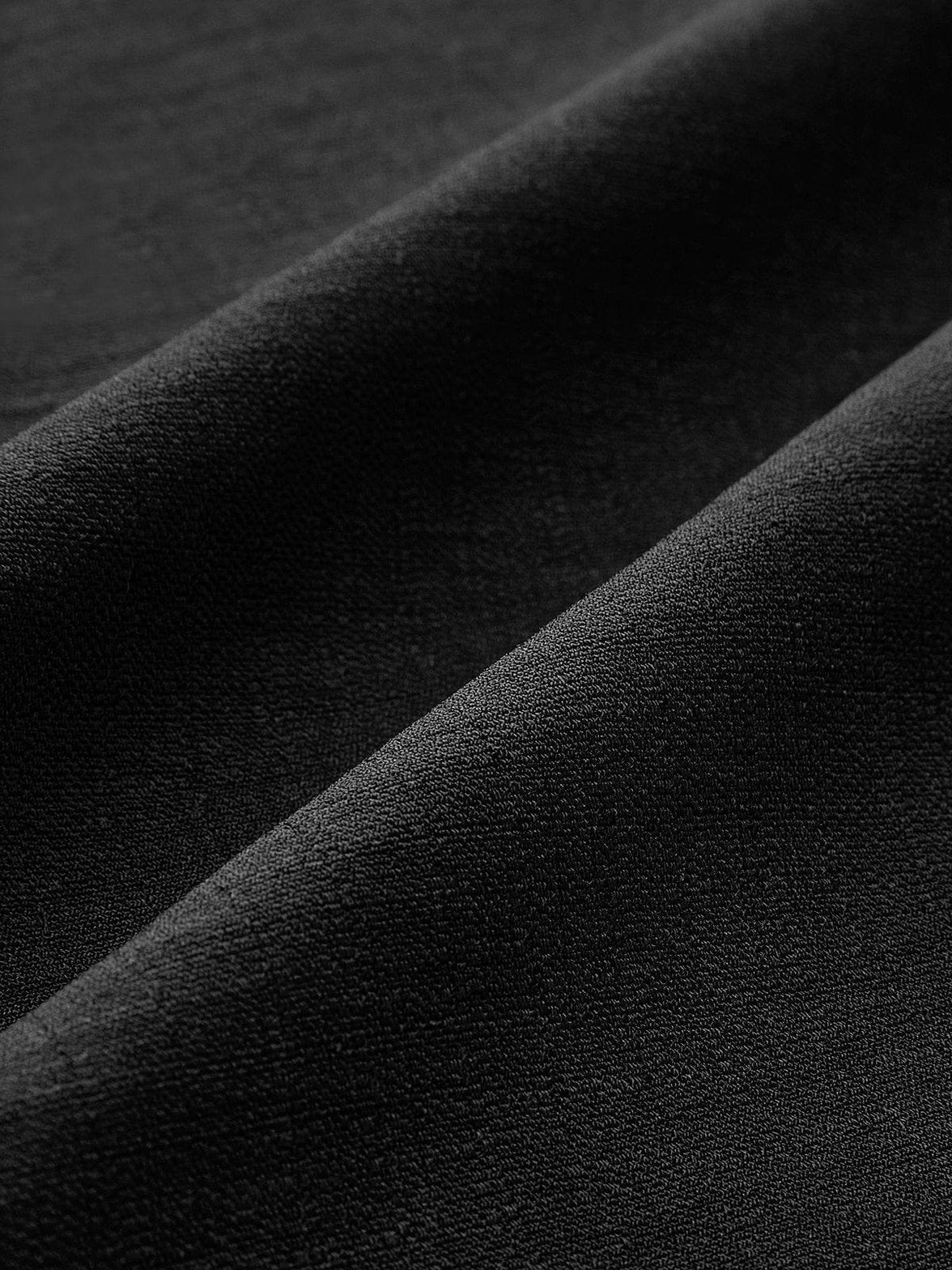 Gilet vintage noir vue de dos nuage