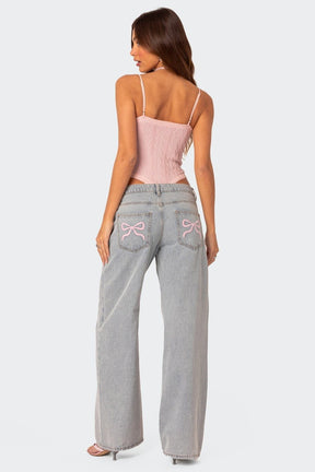 Jean large gris clair avec nœuds décoratifs papillon soleil