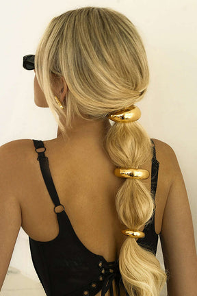 Élastique cheveux doré élégant - Douceur