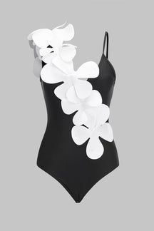 Maillot de bain noir avec fleurs blanches en relief soleil