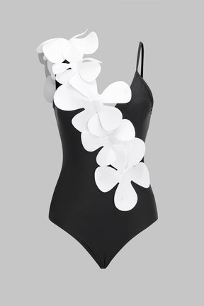 Maillot de bain noir avec fleurs blanches en relief soleil