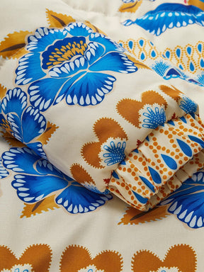 Manteau hiver motif ethnique bleu cristal