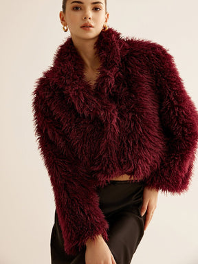 Manteau fausse fourrure détail manche style