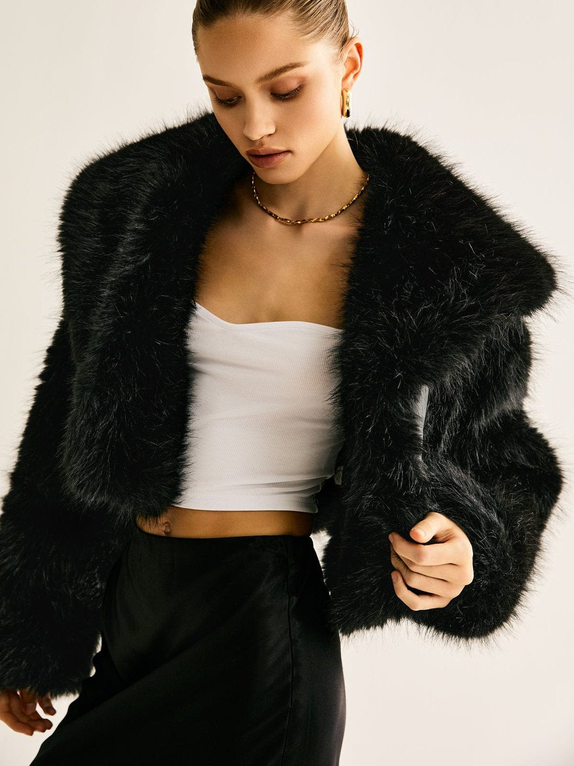 Manteau fausse fourrure noir élégant charm