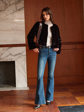Manteau fausse fourrure détail sérénité