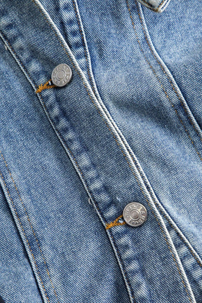 Manteau denim patchwork oversize détail poche lune