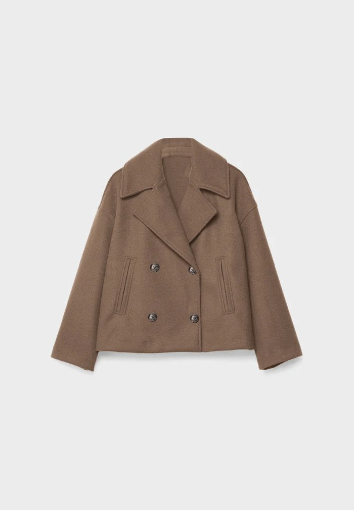 Manteau luxe détails pluie