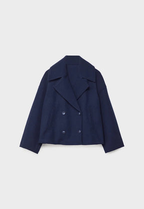 Manteau sophistiqué coupe perle