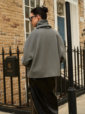 Manteau gris vue profil charme