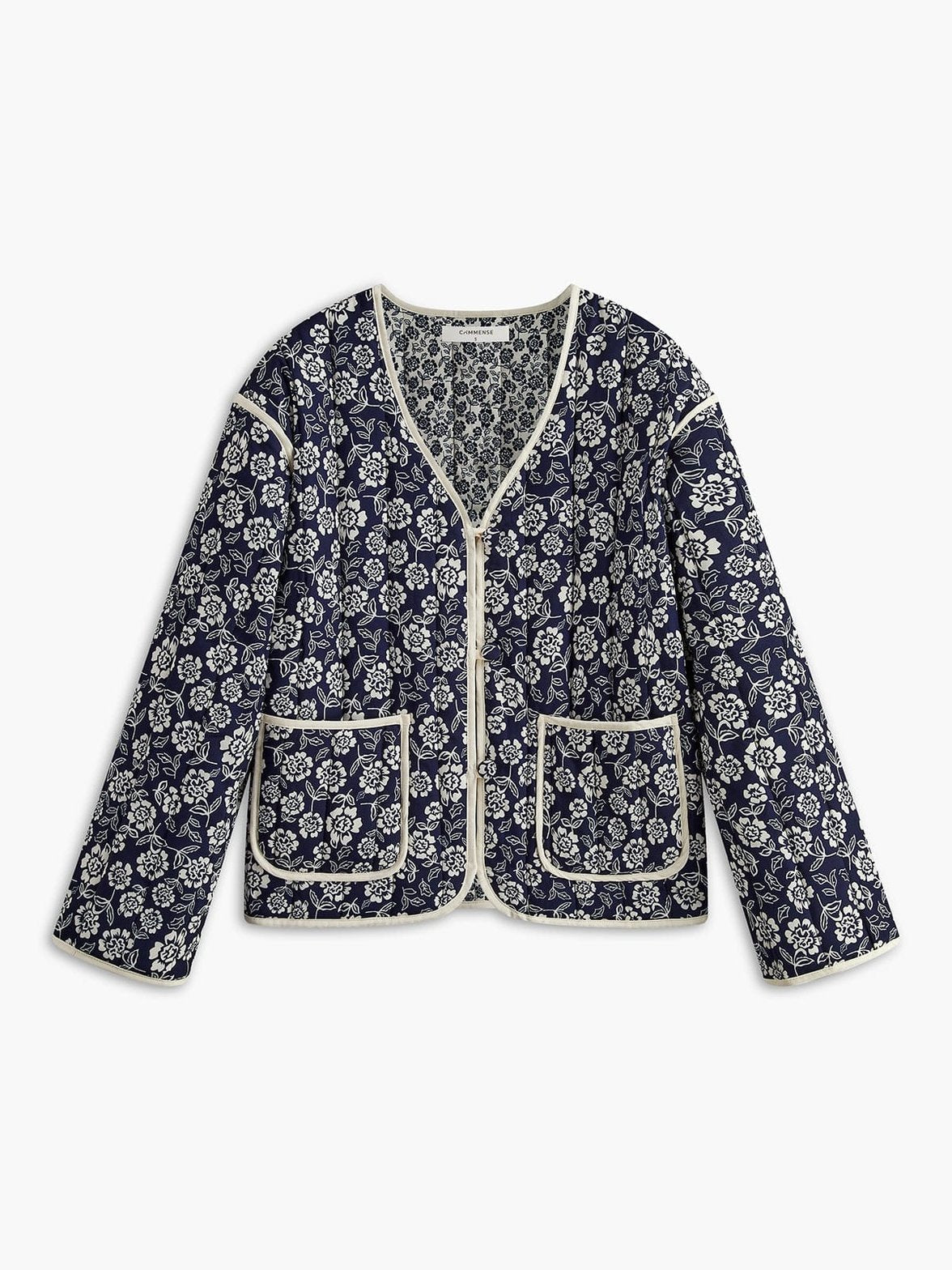 Manteau fleuri bleu marine avec bordures contrastées étoile