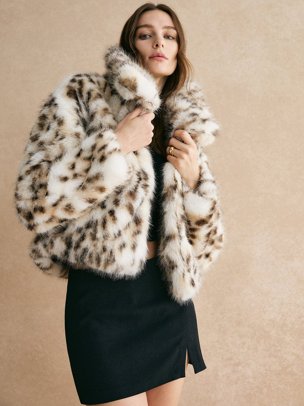 Manteau fausse fourrure motif léopard élégant whisper