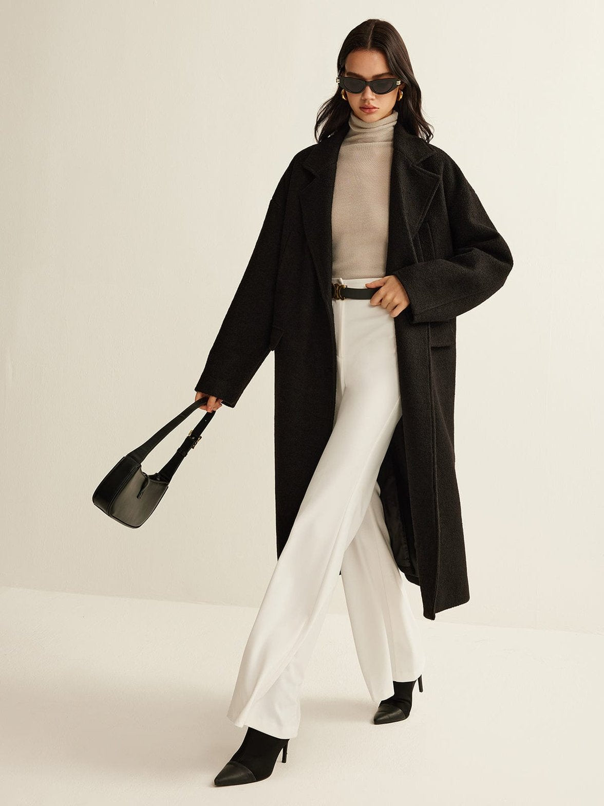 Manteau long tweed noir élégant soleil