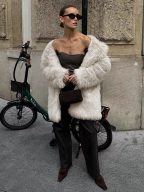 Manteau fausse fourrure blanc chic soyeux