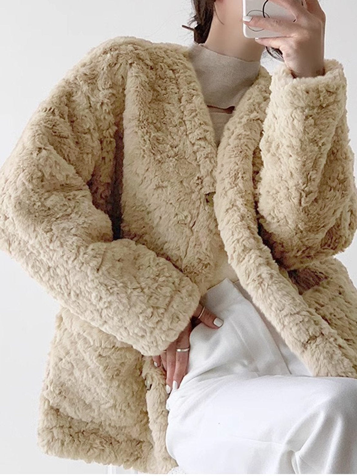 Manteau fausse fourrure élégance