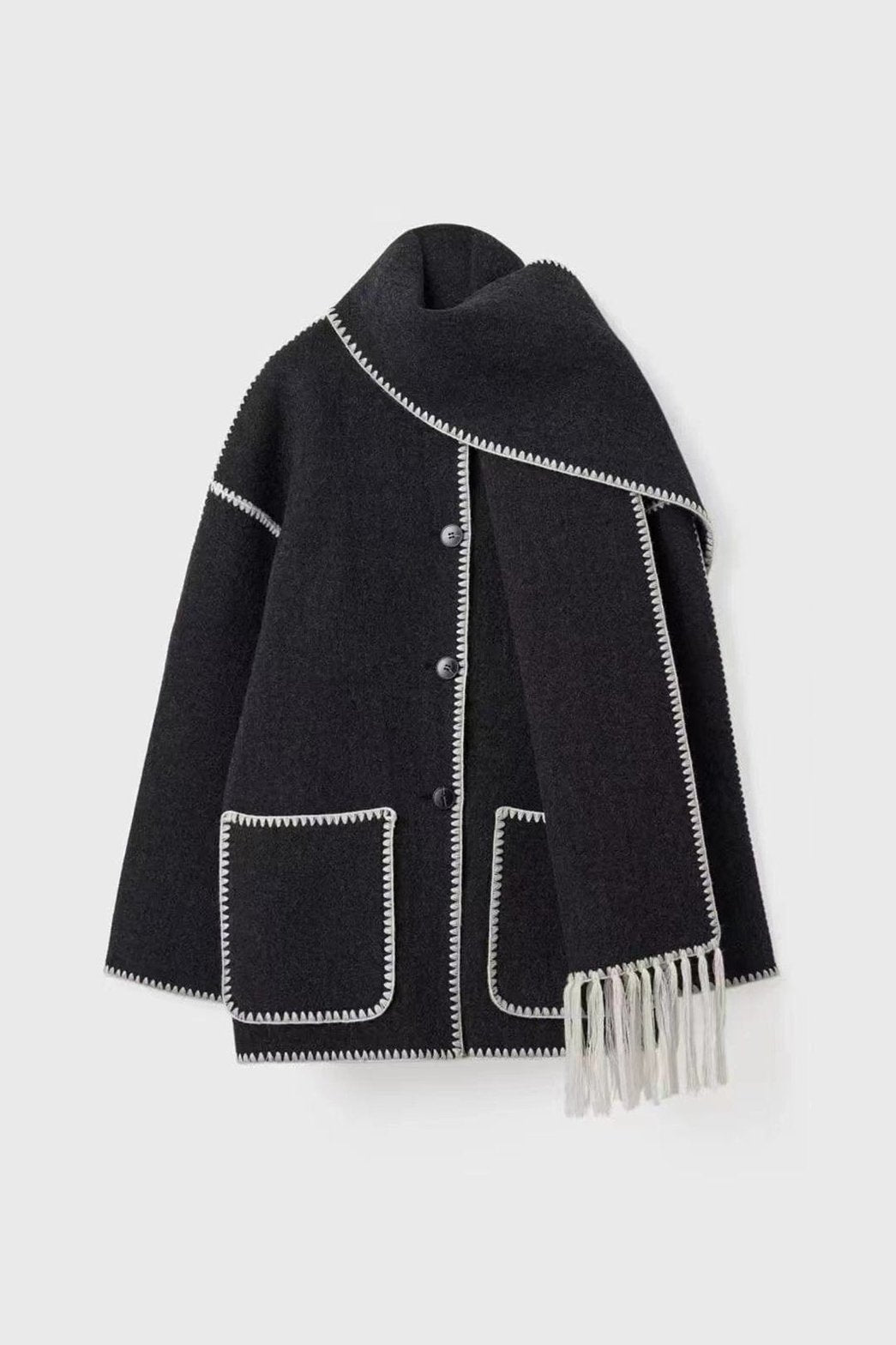 Détail des finitions du manteau élégance